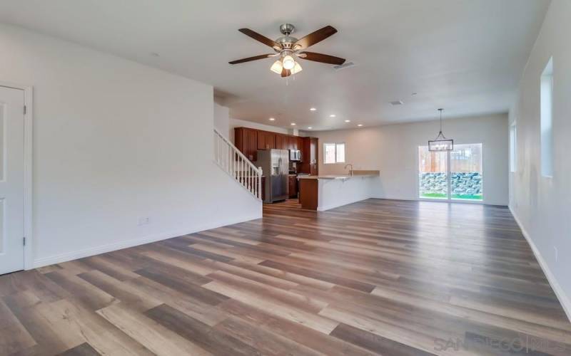 Living room without virtually staged furniture.  The previous virtually staged are to show how nice this open concept can be used.  Thanks.