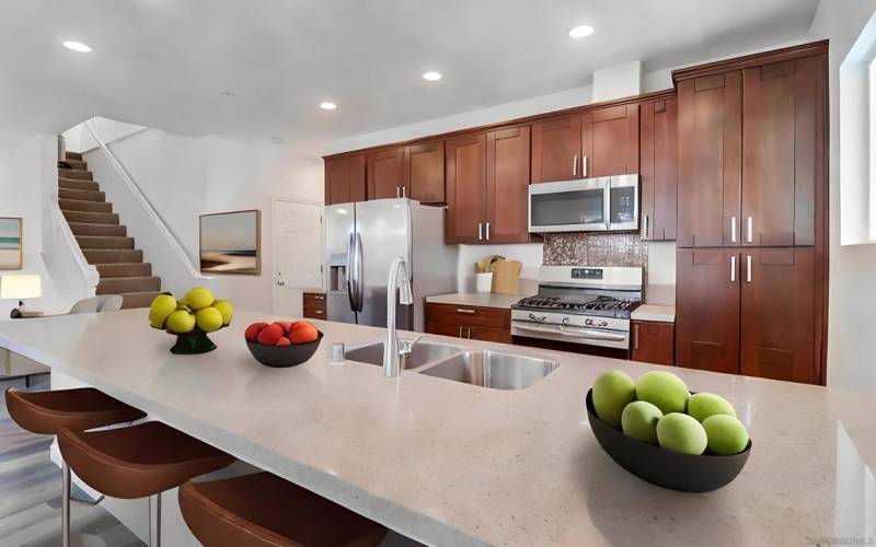 Virtually Staged For Inspiration.  Quartz Counters and designed for seating.