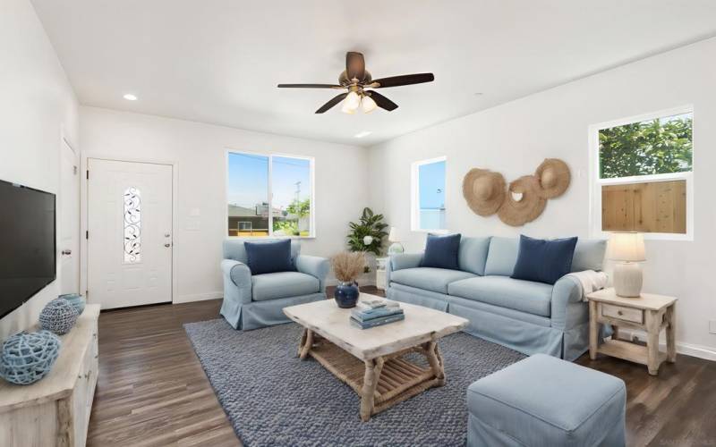 This is virtually staged to give you more inspiration as to what you cound do with this space.  And there is a super large storage area under the stairs, too.