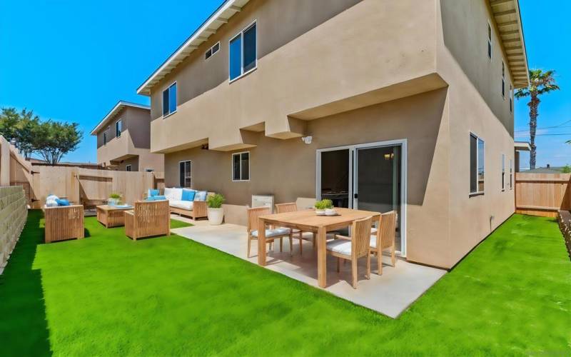 Sprinkled some tables and chairs for the friends and family that are coming over.  This is a beach home so the temperature is cooler than other parts.  You may still want to add shade.