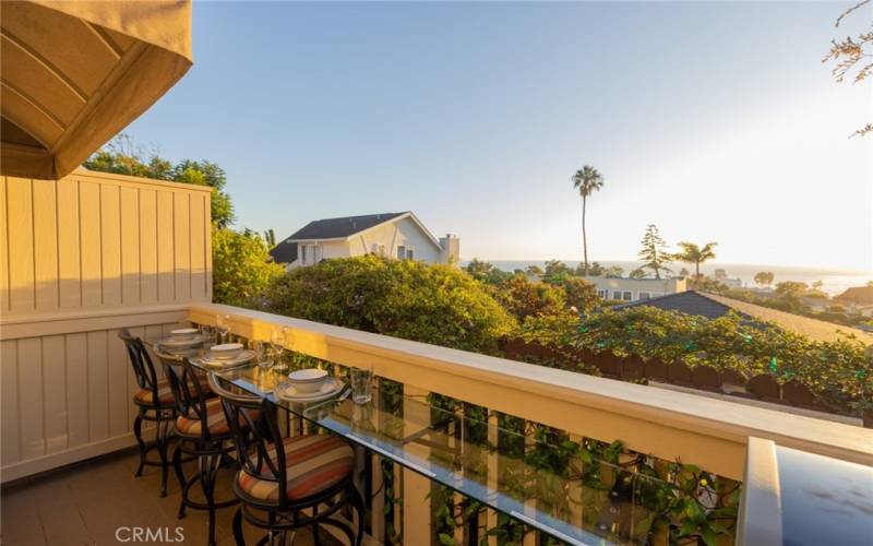 Private Deck with ocean view seating and BBQ.