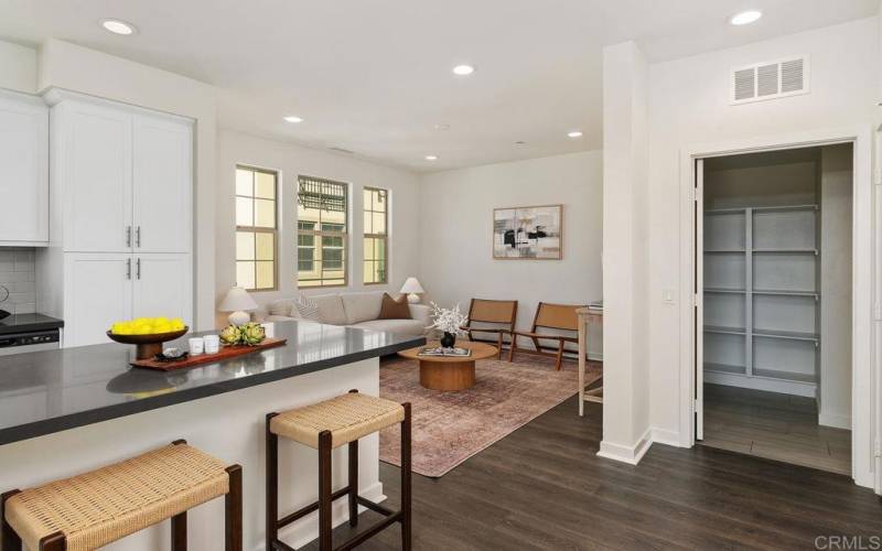 View from kitchen into family room and pantry