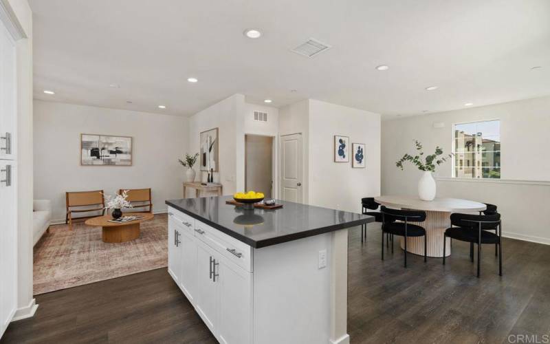 View from kitchen into the family room and dinette