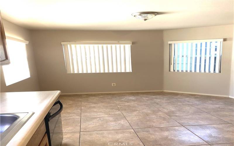 Breakfast nook with outside lights coming in from all around.