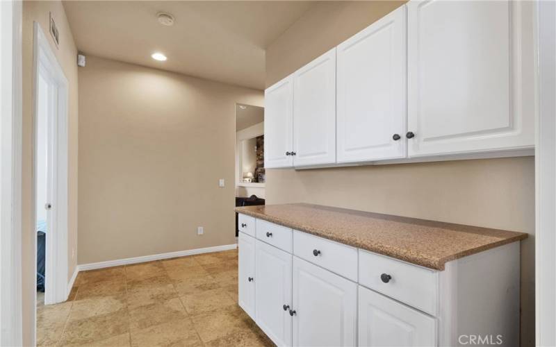 Hall linen storage and folding counter.