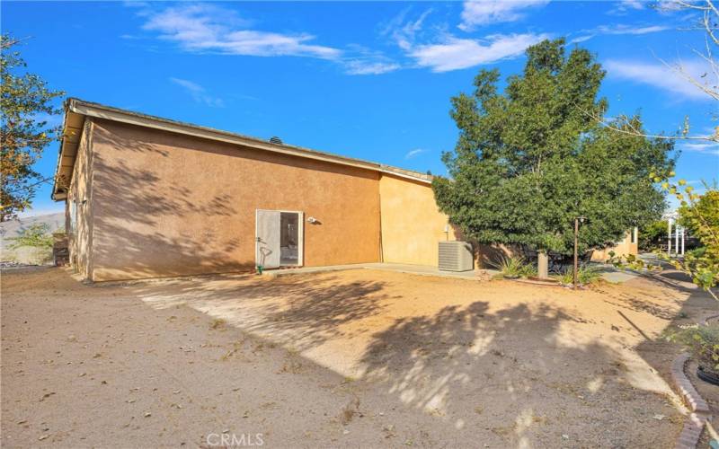 Large flat area for a pool, play set or gazebo.