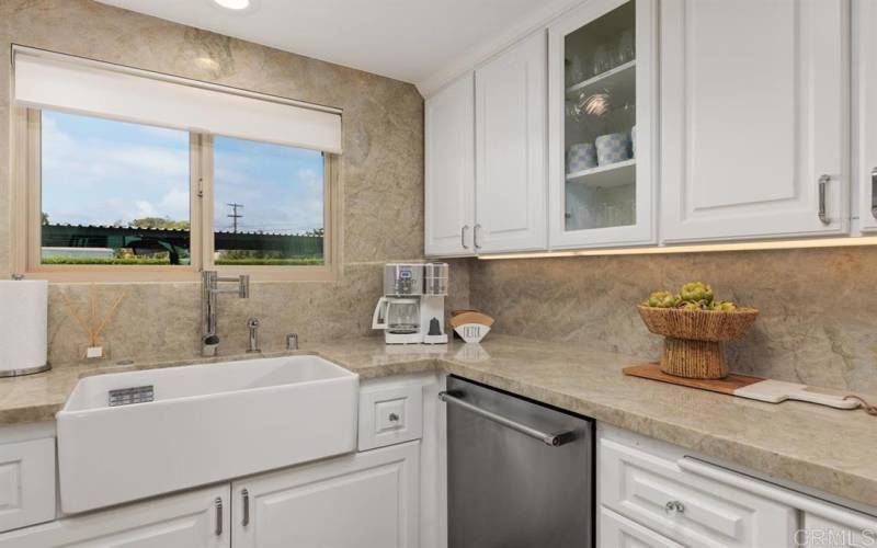 Lovely window in the kitchen to open and feel the ocean breezes!