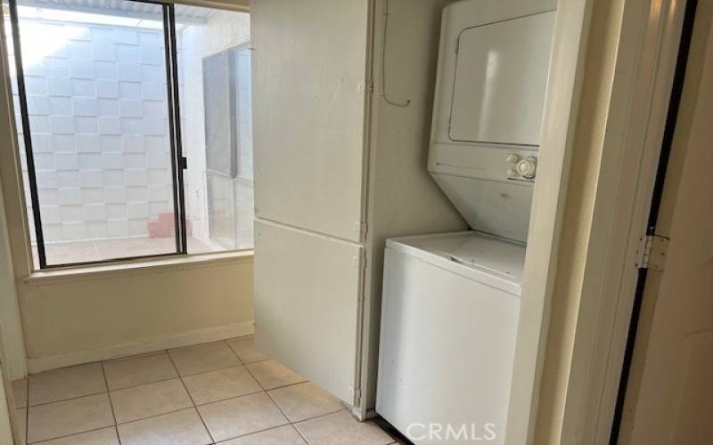 Washer and dryer installed in the hall.