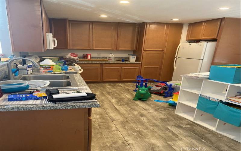 Kitchen with granite counters and appliances