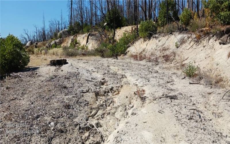 Decomposed granite road up to property