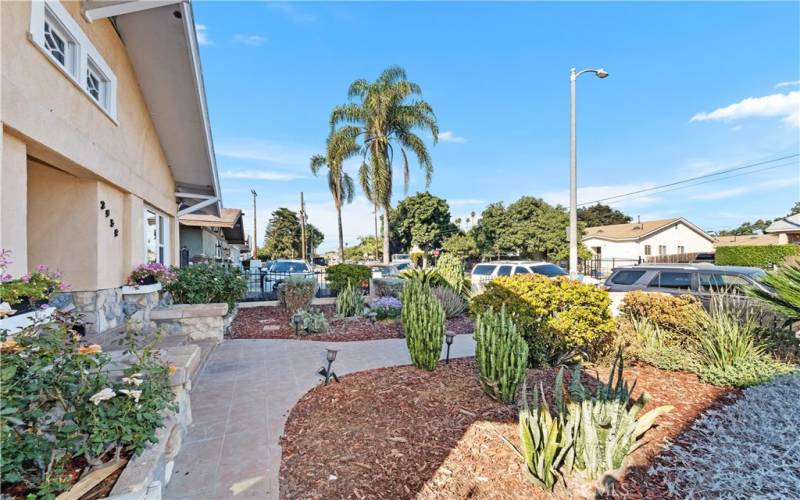 Pretty pathways in front create a functional space for access