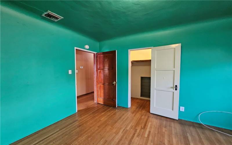 Bedroom with walk-in closet