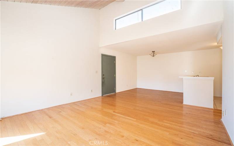 Vaulted ceiling with window that brings in natural light.