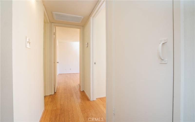 Hallway to bedrooms and bath.