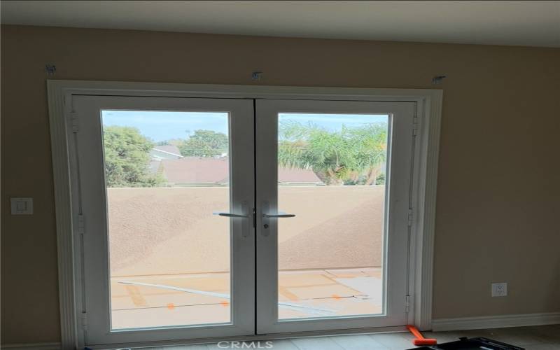 Upstairs bedroom with a balcony