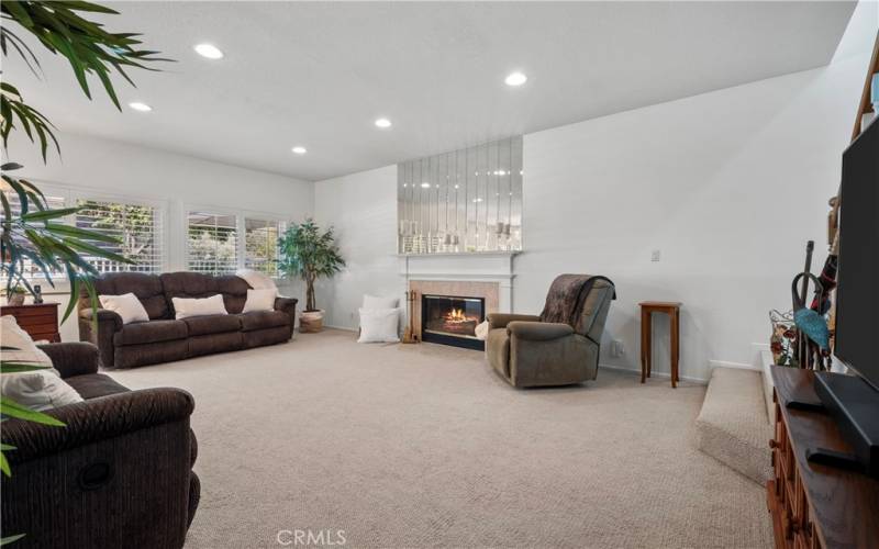 Family room with fireplace.