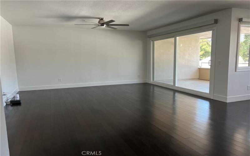 Living area with wood flooring