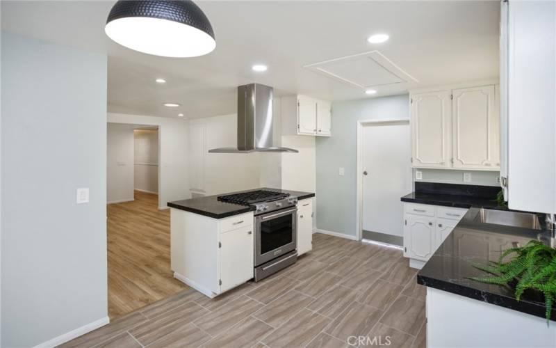 Kitchen view towards family room