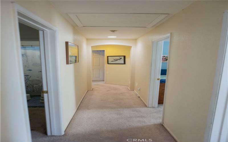 hallway to enter other bedrooms upstairs