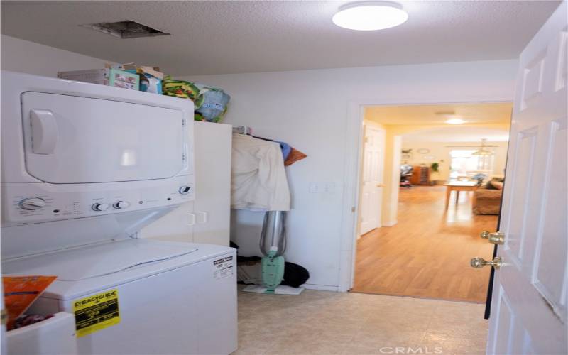 just past the bathroom downstairs is the laundry room