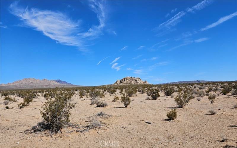 Parcels are on the other side of the mountains. This picture was taken at a distance and is not the actual property. Buyer to verify location with their agent.