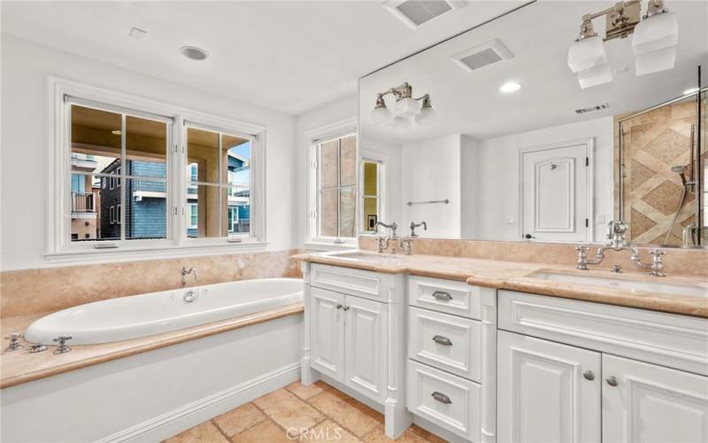 Primary bathroom with jacuzzi tub and separate shower