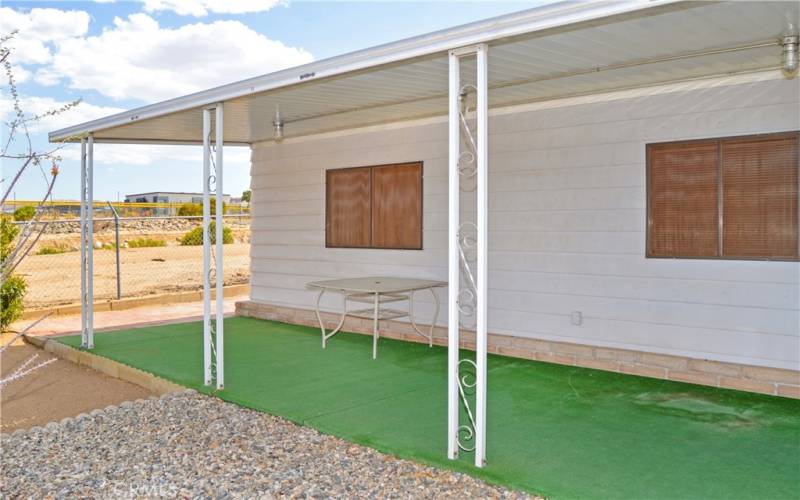 This particular space offers a good-sized yard which is fully fenced for your fur babies, a large covered patio, easy-care desert landscaping, and no neighbors right behind for unobstructed sunrise views.