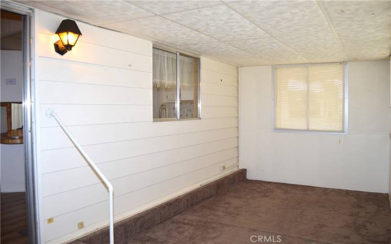 The 167 sq ft bonus room off of the family room is carpeted, has plenty of windows, and has a handy pet door leading to the fenced backyard.