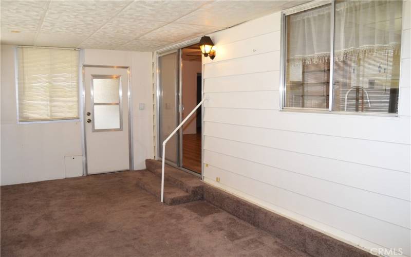 The 167 sq ft bonus room off of the family room is carpeted, has plenty of windows, and has a handy pet door leading to the fenced backyard.