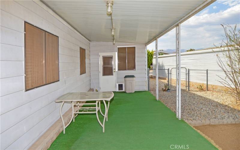 This particular space offers a good-sized yard which is fully fenced for your fur babies, a large covered patio, easy-care desert landscaping, and no neighbors right behind for unobstructed sunrise views.