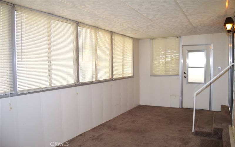 The 167 sq ft bonus room off of the family room is carpeted, has plenty of windows, and has a handy pet door leading to the fenced backyard.