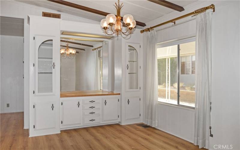 The dining area offers a handy built-in hutch