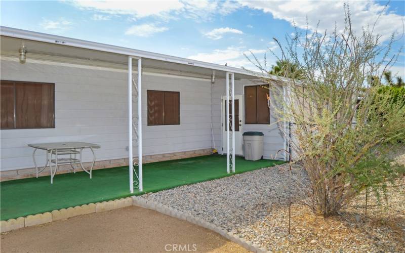 This particular space offers a good-sized yard which is fully fenced for your fur babies, a large covered patio, easy-care desert landscaping, and no neighbors right behind for unobstructed sunrise views.