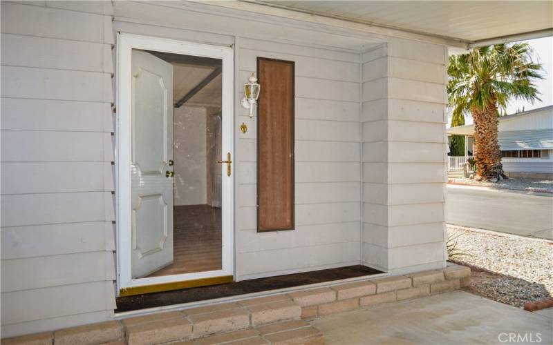 Stylish glass storm door at the front entry