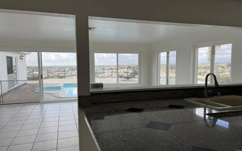 Kitchen. Open to Family room with a 180 PANORAMIC view from the ocean to the mountains.