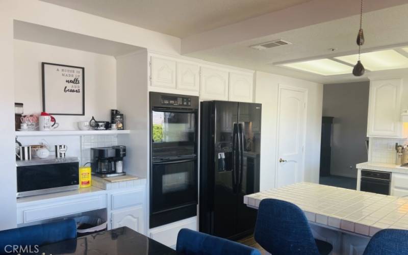 View into kitchen from breakfast table