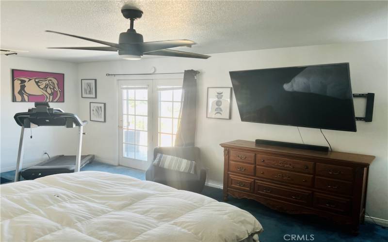 Master bedroom French doors to balcony