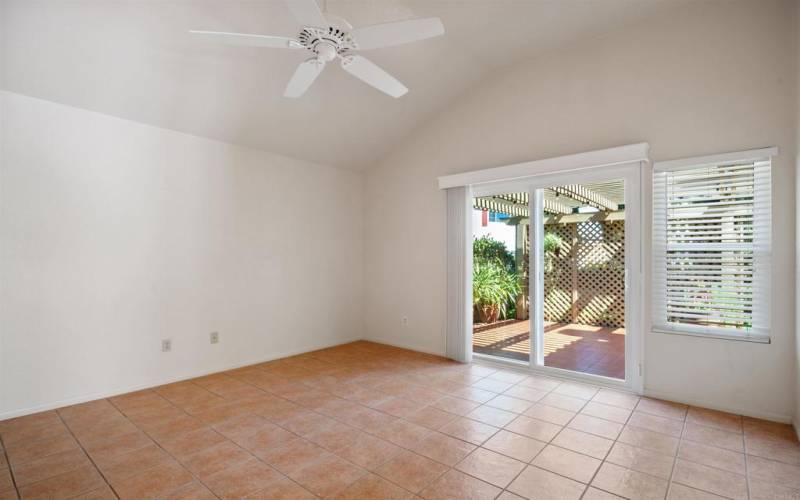 Natural light coming from the private patio flows to the sliding door and window.