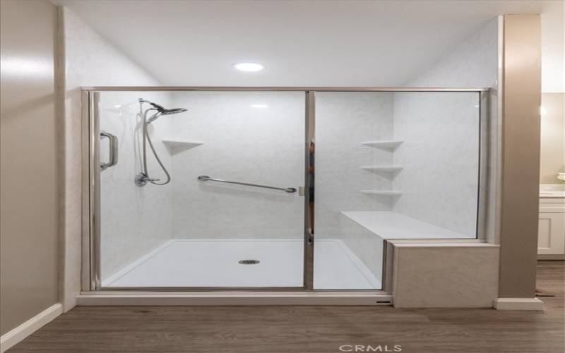 Glass shower in remodeled primary suite