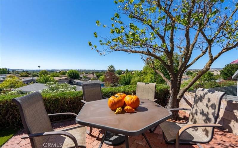 Outdoor dining is framed with views