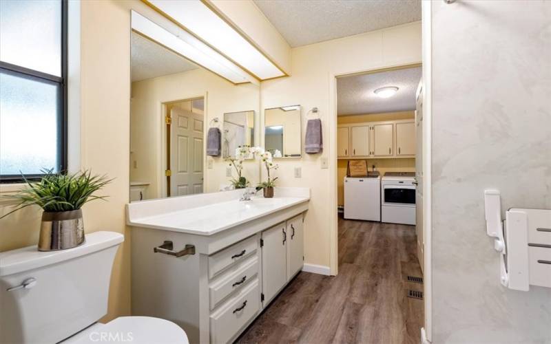 Guest Bathroom attached to the 2nd bedroom and laundry room