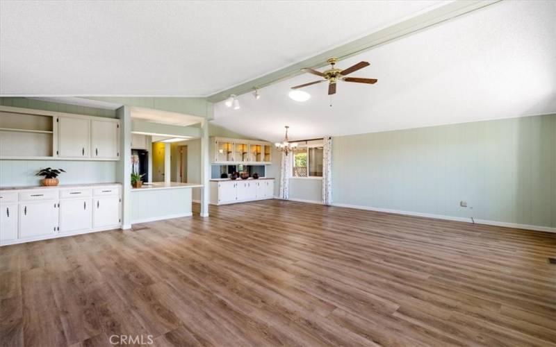 Gleaming luxury vinyl floors tie the living areas together