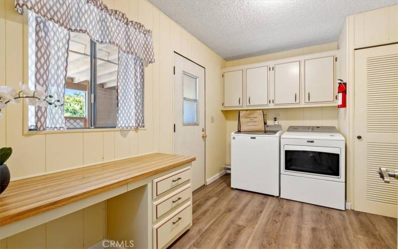 Laundry room with back entrance