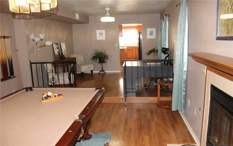 Living room with woodburning fireplace