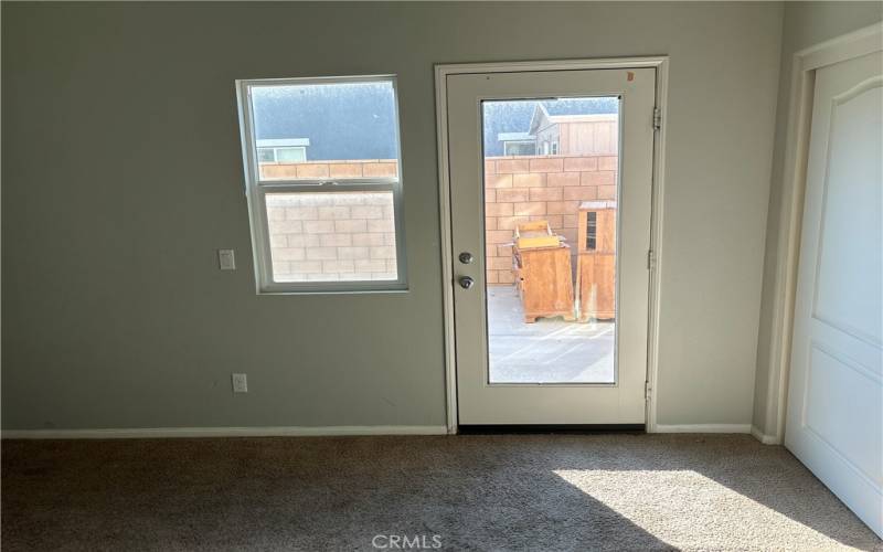 Downstairs Master bedroom private door leading outside