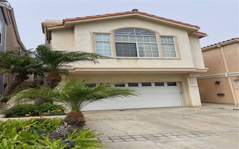 Large driveway with oversized two car garage