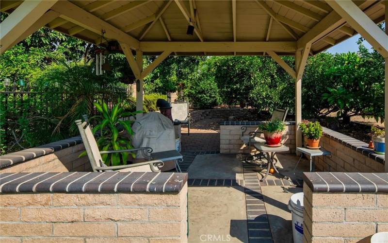 Gazebo covered patio and the chiminea is staying