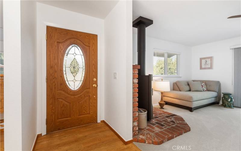 Immediately you are greeted with warm laminate wood floors.