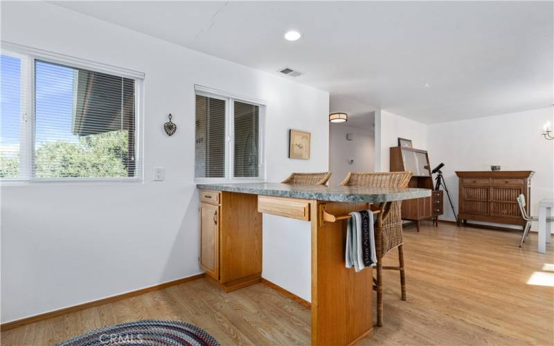 The breakfast bar is a great spot for a casual meal or keeping the cook company.