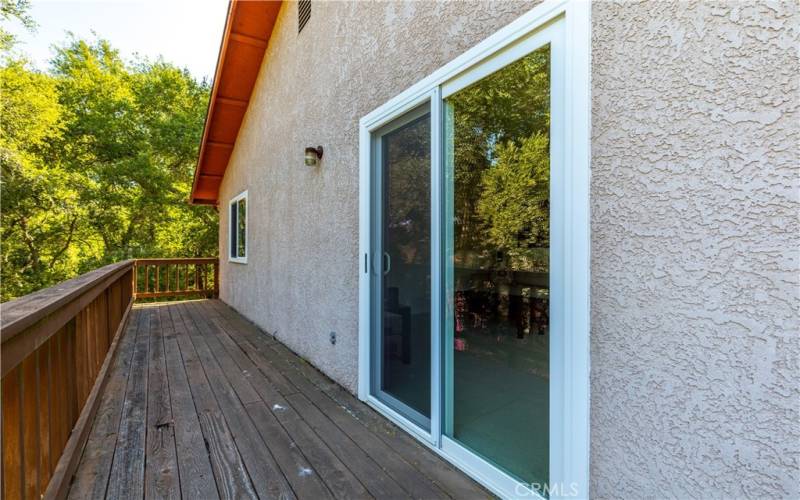 Side deck off the living room would be a great spot for some chairs so you can enjoy the outdoors.